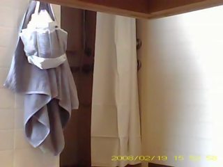 Spying enticing 19 year old teenager showering in dorm bathroom